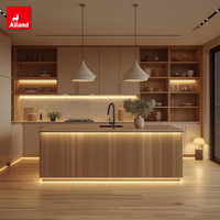 Armoires de cuisine en bois nervuré Allandgroup avec plan de travail en résine et robinet, design moderne pour appartement et salle à manger