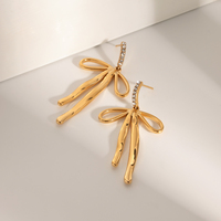 Boucles d'oreilles J&D New Trend Luxury pour femmes, plaquées or 18 carats, en acier inoxydable, avec zircon, en forme de nœud, pour filles