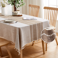 Nouvelle arrivée, nappe en coton et lin personnalisable, couleur unie, avec pompon, imperméable, anti-huile, pour un usage domestique
