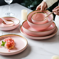 Ensemble d'assiettes à dessert rondes en céramique porcelaine or blanc de haute qualité pour mariage personnalisé avec rebord doré pour restaurant