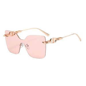 Lunettes de soleil sans monture D Brand, métal doré, verres roses, UV400, style streetwear pour femmes - Product Image 1
