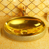 Lavabo en céramique de luxe Lavabo ovale doré électrolytique Bassin d'art Lavabo plaqué or pour salle de bain
