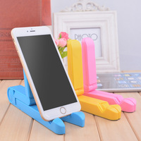 Support de téléphone et de tablette universel pliable triangulaire multifonctionnel en ABS + silicone, nouveau design, pour utilisation sur le bureau