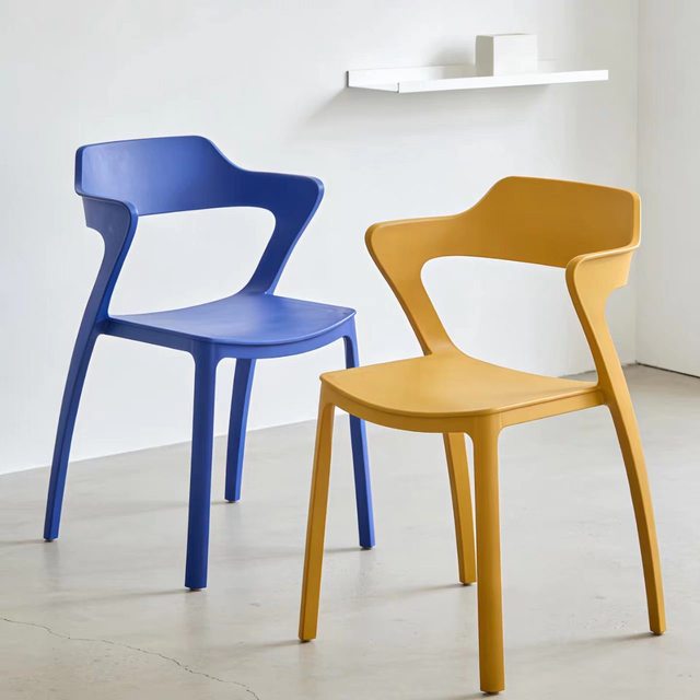Modern Thickened Plastic Stackable Dining Chair with Armrests, Suitable for Home and Patio Use.