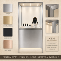Vitrines à bijoux minimalistes de luxe, disponibles en couleurs personnalisées, idéales pour les centres commerciaux haut de gamme et les bijouteries.