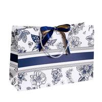 Sac de transport de luxe en papier écologique premium avec poignée renforcée et fermeture à œillet pour les magasins de détail et les boutiques
