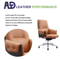 Chaise de bureau exécutive ergonomique moderne à dossier moyen en cuir avec hauteur réglable, pivotante et avec accoudoirs