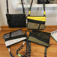 Nouveauté 2026 : Sac bandoulière style Harajuku pour femme et homme, design de niche, mini sac à main portable et tendance pour téléphone, en nylon imperméable