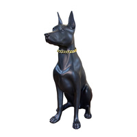 Liefhebber van muziek, thuis, woonkamer, hondenbeeldje, levensecht Doberman Pinscher ornament in hars