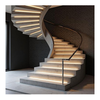 Escalier incurvé décoratif moderne avec marches en pierre artificielle pour appartement