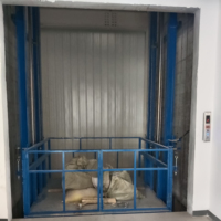 Ascenseur de fret extérieur pour entrepôt d'usine, plateforme élévatrice hydraulique à grandes rails de guidage, capacité de charge 2026 kg