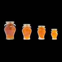Bouteilles en verre transparentes en forme de V de 212 ml (7 oz) de qualité supérieure et abordables avec bouchons en fer blanc noir pour sauces, miel, aliments, épices, remplissage à chaud
