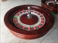 Fabricants d'accessoires de jeux de casino Vente chaude Roue de roulette en bois de 32 pouces de diamètre pour casino 4 jeux de table