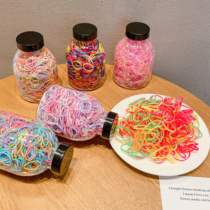 Venta al por mayor 1000 unids/caja de goma de Color caramelo lazos para el cabello <span class=keywords><strong>mujeres</strong></span> niñas bandas elásticas para el cabello <span class=keywords><strong>en</strong></span> botella de plástico lindos accesorios para el cabello - Product Image 6