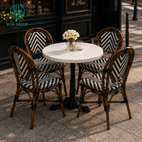 Ensemble de mobilier de café extérieur Ron Group : Bancs personnalisés, table ronde en pierre frittée, chaises empilables en rotin pour restaurant