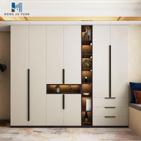 Armoire intégrée sur mesure moderne avec armoire de rangement et étagères de présentation pour un design de mobilier de chambre à coucher de luxe