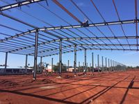 Edificio de Estructura de Acero, Kits de Construcción Metálica Prefabricada con Marco de Hierro Rojo, Almacenes Comerciales, Talleres, Panel Sándwich, Moderno y Resistente