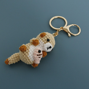 Nouveaux <span class=keywords><strong>porte</strong></span>-clés en tricot mignons tenant des poissons, faits à la main, amigurumi, poupées en tricot, jouets en crochet, animaux en peluche, <span class=keywords><strong>porte</strong></span>-clés en forme de <span class=keywords><strong>loutre</strong></span> - Product Image 1