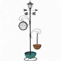 Support de pot de fleurs solaire avec horloge extérieure, aiguille à vent, panier en fibre de coco et cadre en fer recourbé thermolaqué – Décoration de jardin quotidienne
