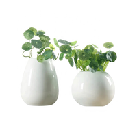 Vase rond en céramique blanche nordique avec décoration de table en boule en porcelaine au design contemporain moderne pour le salon