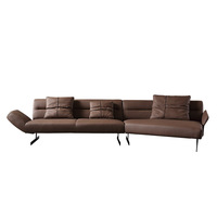 Canapé d'angle incurvé de designer en cuir véritable italien minimaliste, luxe léger, pour salon et petit appartement, en cuir pleine fleur
