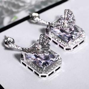 Orecchini pendenti da donna classici in rame placcato oro bianco con fiocco e zirconi, gioielli alla moda - Product Image 3