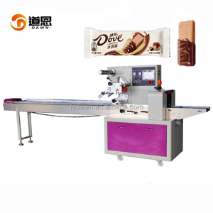 Máquina de embalaje horizontal de barra de energía especial de alimentos multifuncional máquina de embalaje de almohada de barra de chocolate independiente - Product Image 1