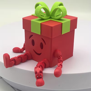 Ornement de boîte cadeau de Noël imprimé en 3D, design de visage souriant articulé, décoration de Noël, ornement créatif de bureau - Product Image 1