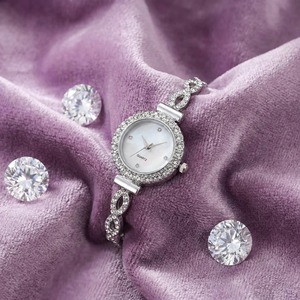 Fashionable and compact round women's bracelet <b>watch</b> with floral pattern women's quartz <b>watch</b> - Product Image 1