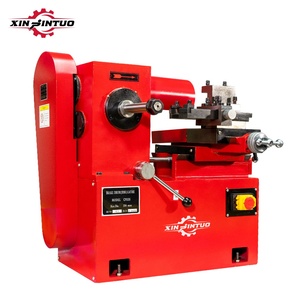 Machine à tournage de freins à disque de petite taille Xinjintuo, prix d'usine bon marché, vente chaude, certifiée CE, adaptable à tous les types de jantes en alliage - Product Image 1