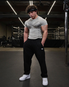 T-shirts de sport sans coutures ultra-extensibles à séchage rapide, coupe ajustée, avec logo frontal et compression pour hommes - Product Image 2