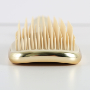 <span class=keywords><strong>Brosse</strong></span> démêlante et coiffante personnalisable avec logo – <span class=keywords><strong>Brosse</strong></span> sans douleur <span class=keywords><strong>pour</strong></span> cheveux bouclés, humides et secs, avec poils souples – Or champagne chromé - Product Image 6
