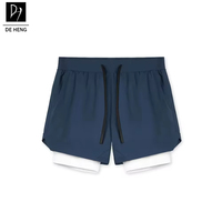Dubbellaagse sport shorts voor heren met ingebouwde telefoonvak, ademend mesh, geschikt voor gym, hardlopen en fitness, casual shorts