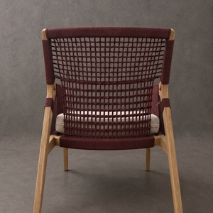 The Alula <b>chair</b> is crafted from luxurious <b>teak</b> wood and durable rope, designed to offer both elegance and comfort. - Product Image 1
