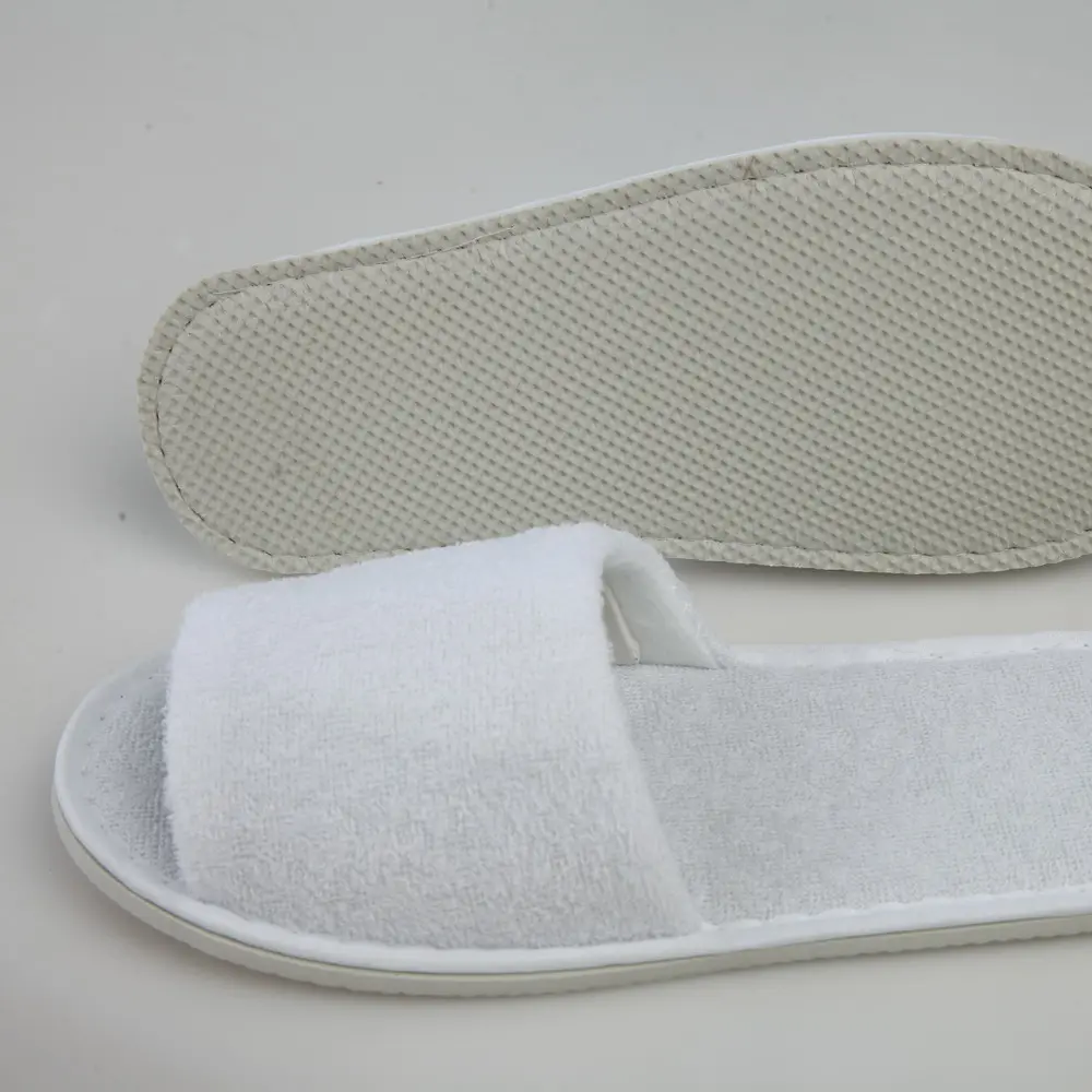 Zapatillas de SPA personalizadas para dormitorio de hotel, zapatos desechables de terciopelo para interior de hotel, tela de algodón blanco, venta al por mayor