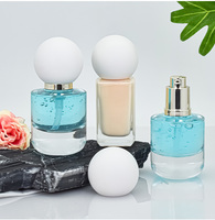 Sérum d'essence de luxe, parfum, huile essentielle, lotion, vaporisateur, flacon personnalisable de 30 ml, cylindrique, rond, en verre transparent, fond épais