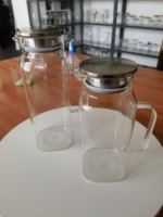 Bouteille d'eau Garafe carrée en verre avec couvercle et poignée en acier inoxydable Pichet à eau en verre