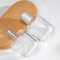 Flacon vaporisateur de parfum à base épaisse personnalisé Offre Spéciale 30ml 50ml flacon de parfum en verre vide transparent lourd avec pompe de pulvérisation