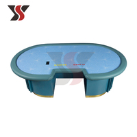 Table de jeu de casino YS LED Baccarat avec console de croupier, accoudoir en cuir turquoise, base cannelée, garniture dorée, personnalisable OEM
