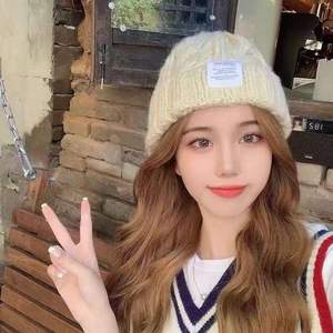 หมวกกันหนาวอเนกประสงค์แฟชั่นหมวกขนสัตว์สีทึบหมวกถักนิตติ้งที่ป้องกันหูให้ความอบอุ่น - Product Image 6