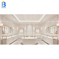 Vitrine de présentation de bijoux et de montres personnalisée de luxe multifonctionnelle avec éclairage LED, étanche, durable, en verre trempé incurvé