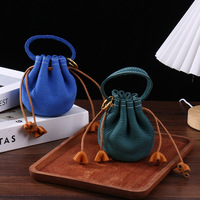 Pochette de rangement cylindrique souple cousue de première qualité avec cordon de serrage pour accessoires d'écouteurs, sac porte-bonheur, porte-monnaie