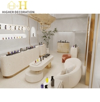 Vitrine de présentation de style luxe léger en travertin, personnalisable avec logo, pour bar à parfums et présentoir de parfums
