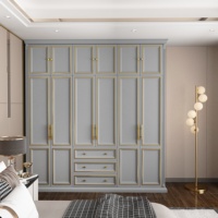 Armoire grise minimaliste moderne avec poignées dorées, grande capacité, pour chambre à coucher, avec tiroirs et portes, pour la maison