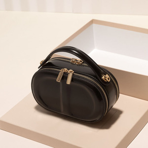 Elegant Women's Genuine Leather Oval <b>Mini</b> Bag With Round Handle Zip Closure Daily Use Handbag - Product Image 4