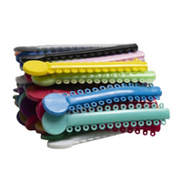 Attaches élastiques orthodontiques multicolores, matériaux correcteurs dentaires, anneaux en O à haute élasticité