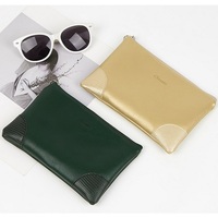 Sac à cosmétiques en cuir PU verni bon marché pour hommes, organisateur de toilette promotionnel imperméable pour femmes, pochette à fermeture éclair plate classique pour cosmétiques