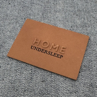 Étiquettes en cuir véritable personnalisées de haute qualité, écologiques, avec logo personnalisé en relief, étiquettes en cuir PU pour chapeaux