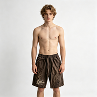 Shorts en vinyle marron imprimé, finition délavée à l'acide, texture effet soleil, toucher doux, vêtement décontracté, prix direct usine, faible MOQ, support dropshipping