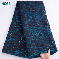 Tissu en dentelle brodée africaine bleue unie en gros 2025, dentelle damassée dorée brodée à la française pour robes de mariée femme 4063